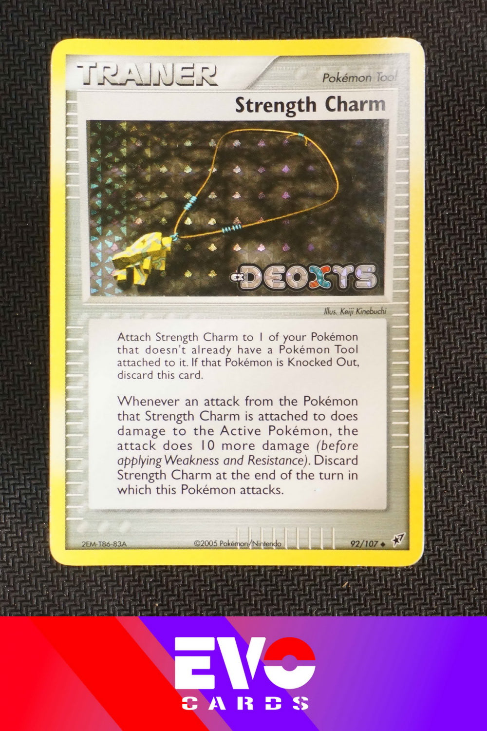 Strength Charm 92/107 - ex Deoxys - Reverse Holo - Near Mint